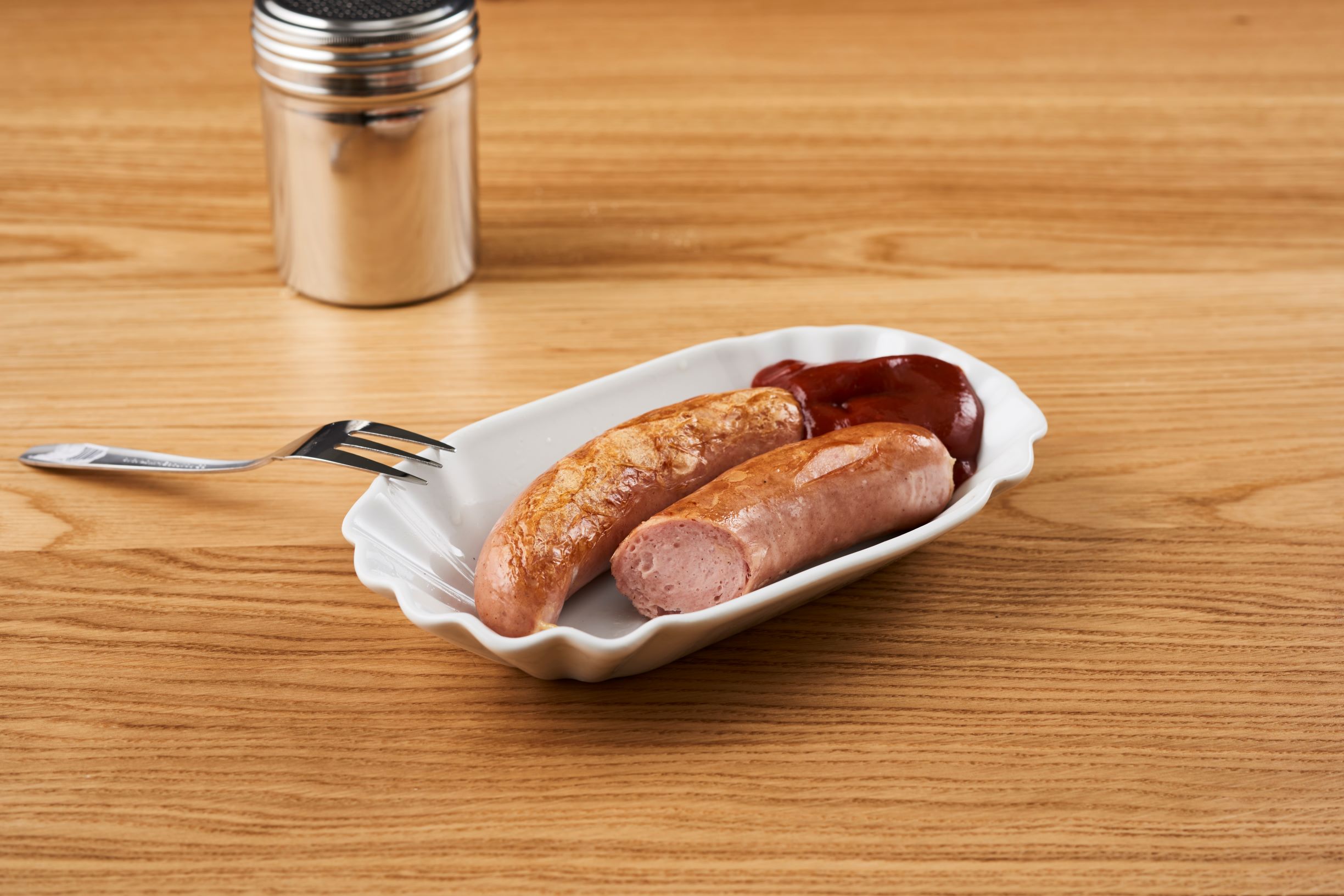 10er Packung Berlin-Mitte Currywurst mit Pelle 10er Packung Berlin-Mitte Currywurst mit Pelle